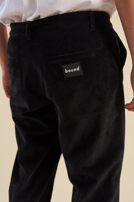 Load image into Gallery viewer, bound &amp;#39;Midnight Black&amp;#39; Cord Trousers
