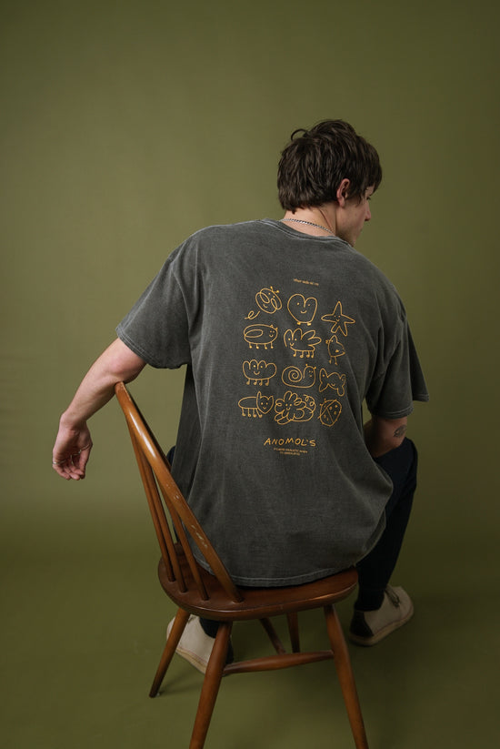 Load image into Gallery viewer, Other Side Store &amp;#39;Anomols&amp;#39; Vintage Washed Tee - Black
