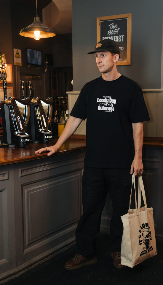 Load image into Gallery viewer, Guinness x UN:IK &amp;#39;Worldwide&amp;#39; Tee - Black
