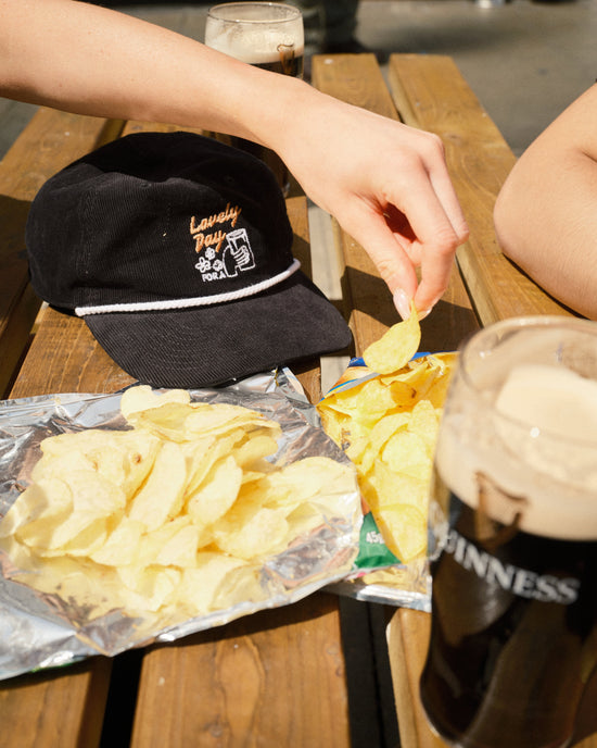 Guinness x UN:IK 'Cheers' Embroidered Cord Rope Cap - Black