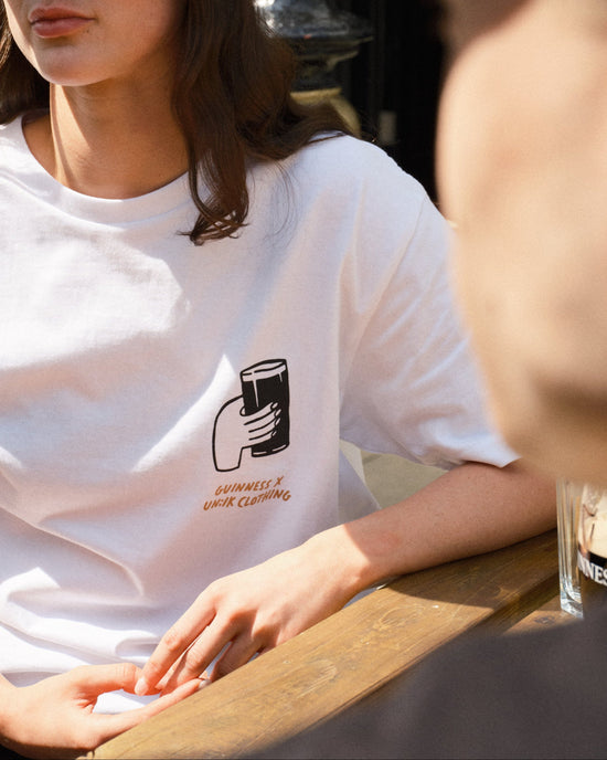 Load image into Gallery viewer, Guinness x UN:IK &amp;#39;Cheers&amp;#39; Tee - White
