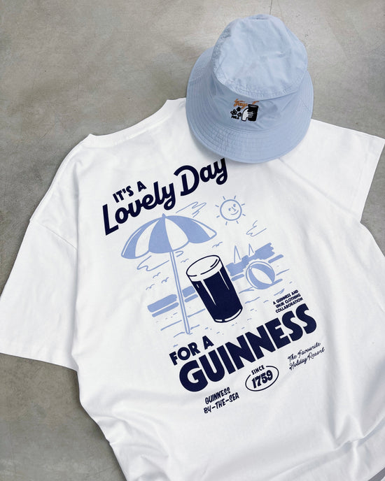 Load image into Gallery viewer, Guinness x UN:IK &amp;#39;Cheers&amp;#39; Bucket Hat - Powder Blue
