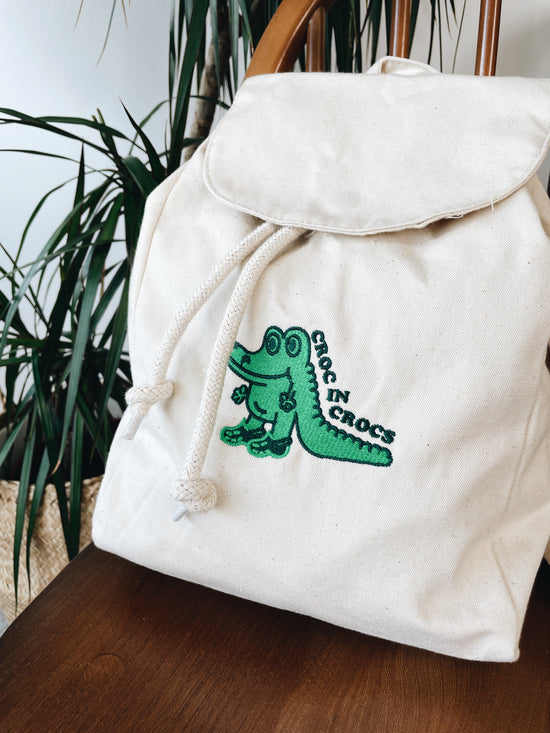 Other Side Store Crocs Embroidered Mini Backpack Natural UN IK Clothing