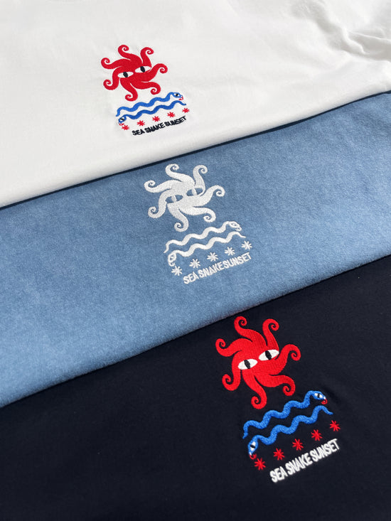 Load image into Gallery viewer, KBAR X UN:IK &amp;#39;Sea Snake&amp;#39; Vintage Washed Embroidered Tee - Blue
