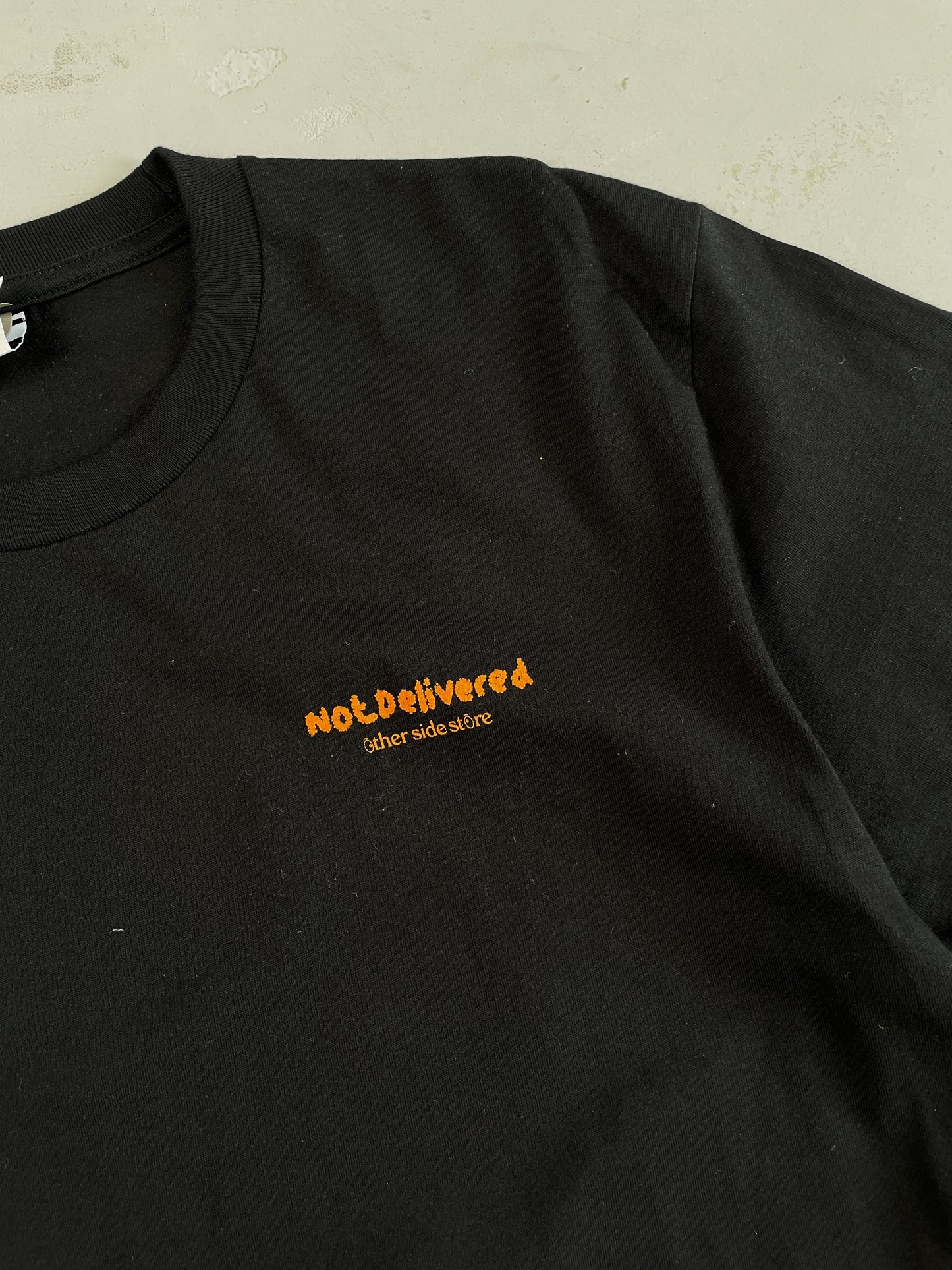 Load image into Gallery viewer, Other Side Store &amp;#39;Not Delivered&amp;#39; Tee - Black
