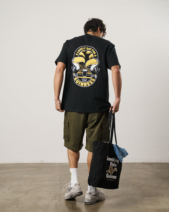Load image into Gallery viewer, Guinness x UN:IK &amp;#39;Tropical&amp;#39; Tee - Black
