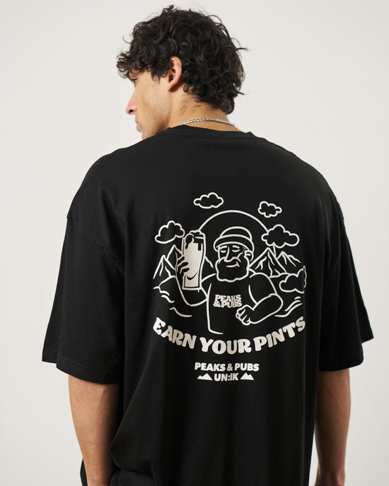 Load image into Gallery viewer, Peaks &amp;amp; Pubs &amp;#39;Earn Your Pints&amp;#39; Tee - Black

