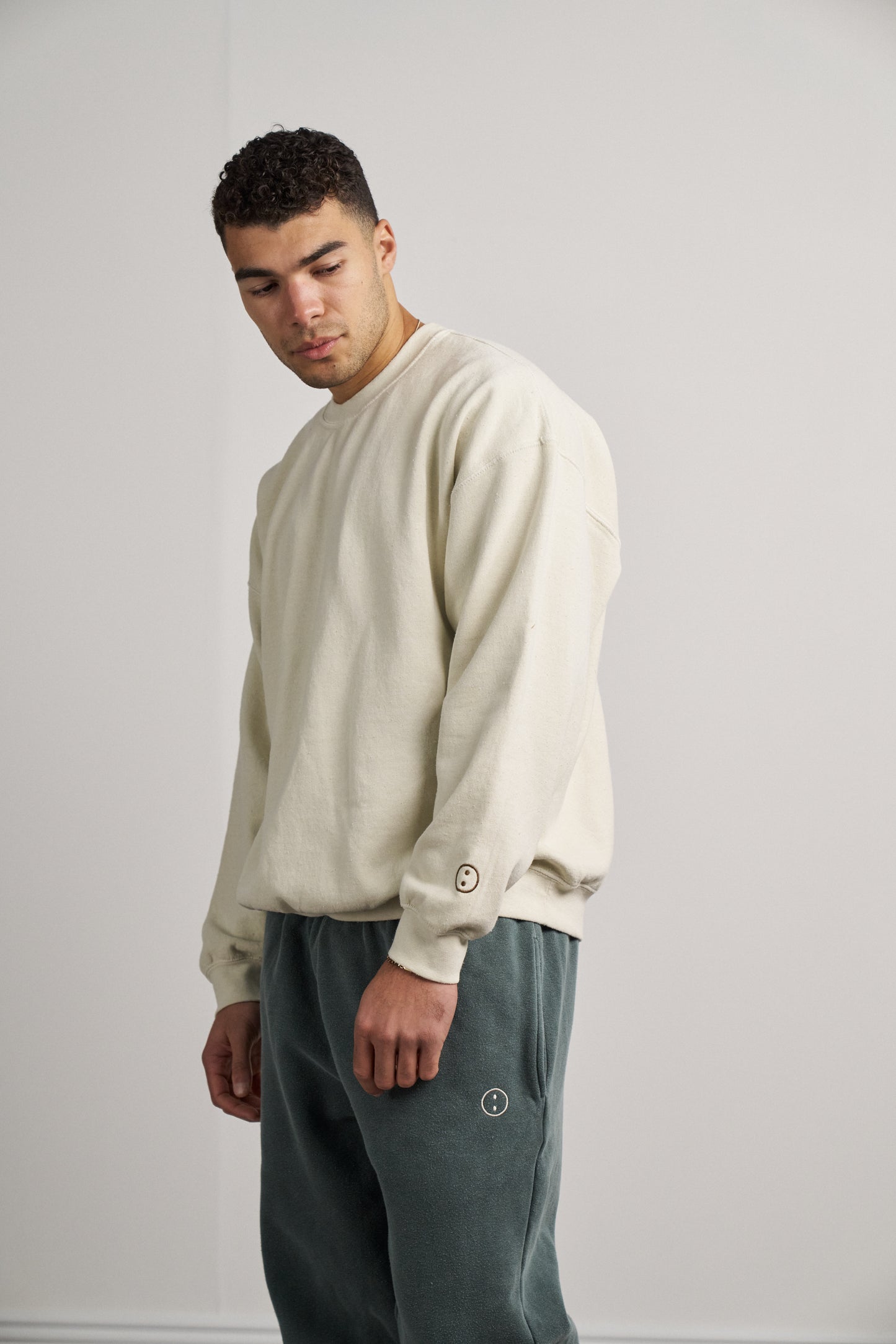 Load image into Gallery viewer, Essentials Vintage Washed Sweater - Ivory
